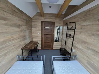 Łóżko lub łóżka w pokoju w obiekcie Rooms4Rest Skibicka - Private rooms for tourists