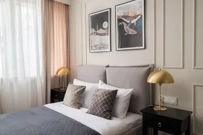 Łóżko lub łóżka w pokoju w obiekcie Metro Wierzbno Deluxe Apartment by BookingHost