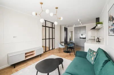 Część wypoczynkowa w obiekcie Metro Wierzbno Deluxe Apartment by BookingHost