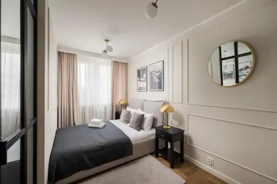 Łóżko lub łóżka w pokoju w obiekcie Metro Wierzbno Deluxe Apartment by BookingHost