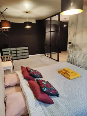 Łóżko lub łóżka w pokoju w obiekcie Stylowy apartament przy rezerwacie
