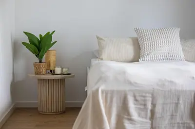 Łóżko lub łóżka w pokoju w obiekcie Modern and Comfortable Studios with Smart TVs near PGE by Noclegi Renters