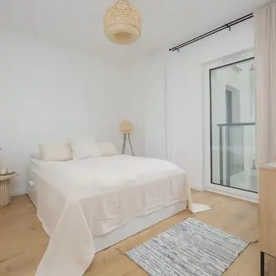 Modern and Comfortable Studios with Smart TVs near PGE by Noclegi Renters