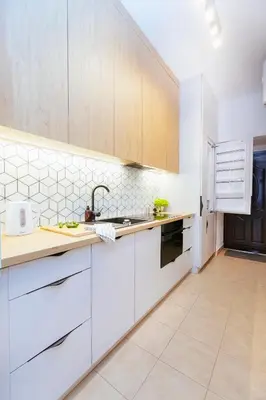Kuchnia lub aneks kuchenny w obiekcie Poznańska 12 - Better Rental