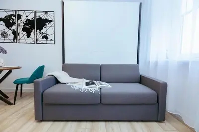 Część wypoczynkowa w obiekcie Poznańska 12 - Better Rental