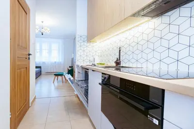 Kuchnia lub aneks kuchenny w obiekcie Poznańska 12 - Better Rental