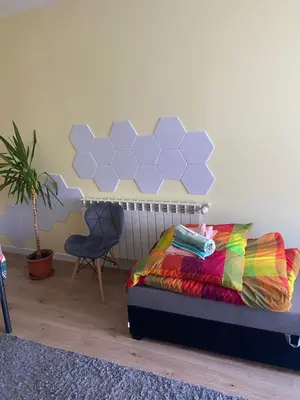 Łóżko lub łóżka w pokoju w obiekcie Monika House