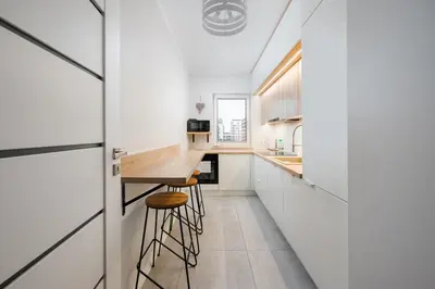 Kuchnia lub aneks kuchenny w obiekcie Racjonalizacji Stylish Apartment by BookingHost