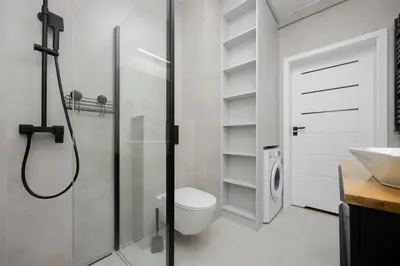 Łazienka w obiekcie Comfortable Apartment with Two Bedrooms & Parking by Noclegi Renters