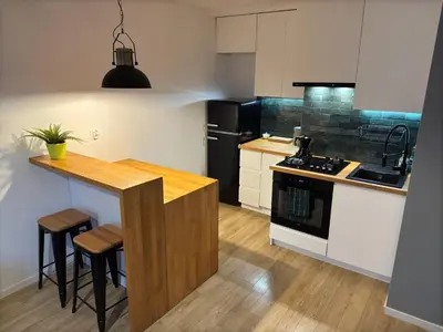 Kuchnia lub aneks kuchenny w obiekcie Nowolipie 16, City Center Apartment