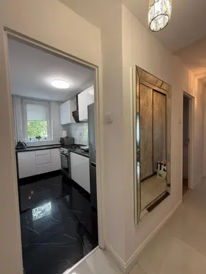 Kuchnia lub aneks kuchenny w obiekcie Saska Kępa Apartament LUX