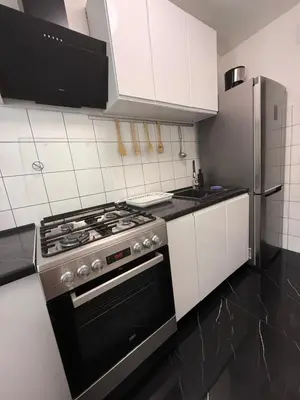 Kuchnia lub aneks kuchenny w obiekcie Saska Kępa Apartament LUX