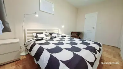 Łóżko lub łóżka w pokoju w obiekcie Apartament Metro Natolin