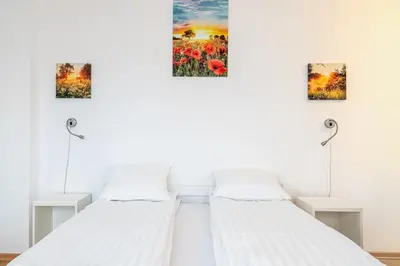 Łóżko lub łóżka w pokoju w obiekcie RentPlanet - Studio Aleje Jerozolimskie