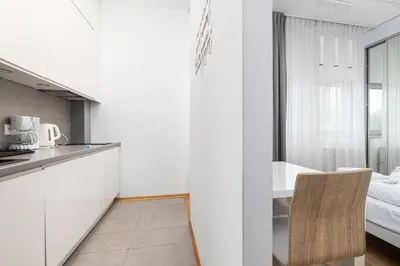 Łóżko lub łóżka w pokoju w obiekcie RentPlanet - Studio Aleje Jerozolimskie