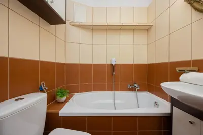 Łazienka w obiekcie Mokotów Modern Apartment with Desk for Remote Work by Noclegi Renters