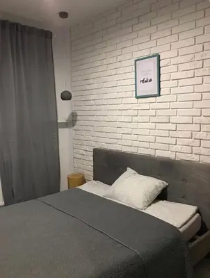 Łóżko lub łóżka w pokoju w obiekcie Zielony Tarchomin