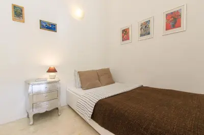 Łóżko lub łóżka w pokoju w obiekcie Rental Apartments Poznańska