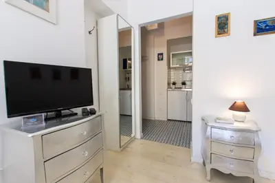Telewizja i/lub zestaw kina domowego w obiekcie Rental Apartments Poznańska