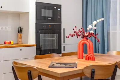 Kuchnia lub aneks kuchenny w obiekcie Sobieskiego 109 by Homeprime
