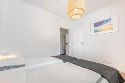 Łóżko lub łóżka w pokoju w obiekcie Apartament Zwierz