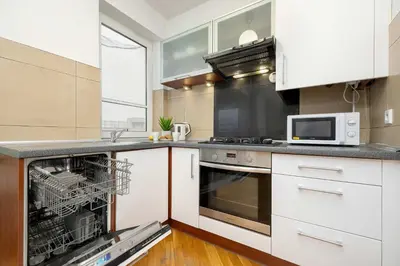 Kuchnia lub aneks kuchenny w obiekcie Stylowy Apartament dla 6 Osób z Parkingiem by Noclegi Renters