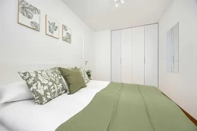 Łóżko lub łóżka w pokoju w obiekcie Stylowy Apartament dla 6 Osób z Parkingiem by Noclegi Renters
