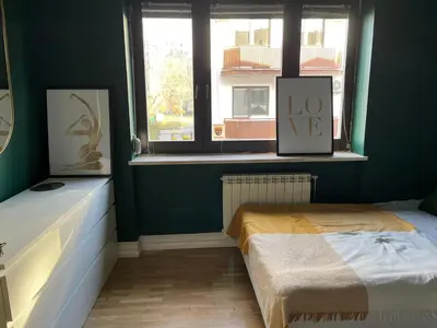 Łóżko lub łóżka w pokoju w obiekcie Noclegi Willa Saska