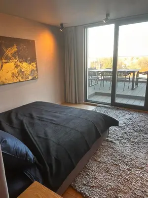 Łóżko lub łóżka w pokoju w obiekcie Warsaw Glamour Penthouse