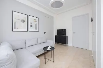 Telewizja i/lub zestaw kina domowego w obiekcie Modern Apartments with Air Conditioning in Warsaw Close to Three Parks by Renters Prestige