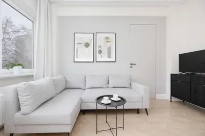 Telewizja i/lub zestaw kina domowego w obiekcie Modern Apartments with Air Conditioning in Warsaw Close to Three Parks by Renters Prestige