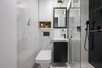 Łazienka w obiekcie Metro Ratusz Arsenał Deluxe Apartment by BookingHost