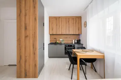 Kuchnia lub aneks kuchenny w obiekcie Metro Ratusz Arsenał Deluxe Apartment by BookingHost