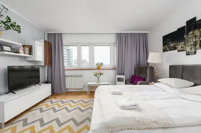 Łóżko lub łóżka w pokoju w obiekcie ShortStayPoland Ogrodowa B144
