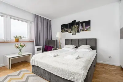 Łóżko lub łóżka w pokoju w obiekcie ShortStayPoland Ogrodowa B144