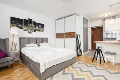 Łóżko lub łóżka w pokoju w obiekcie ShortStayPoland Ogrodowa B144