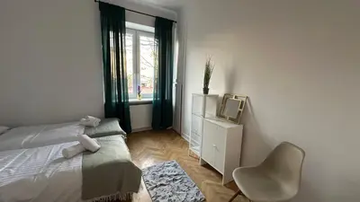 Łóżko lub łóżka w pokoju w obiekcie Odolańska Apartament Stary Mokotów 62m2