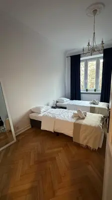 Łóżko lub łóżka w pokoju w obiekcie Odolańska Apartament Stary Mokotów 62m2