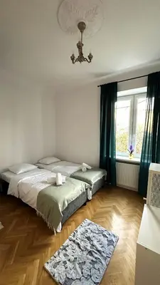Łóżko lub łóżka w pokoju w obiekcie Odolańska Apartament Stary Mokotów 62m2