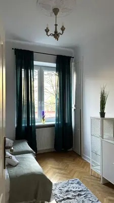 Łóżko lub łóżka w pokoju w obiekcie Odolańska Apartament Stary Mokotów 62m2