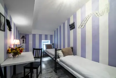 Łóżko lub łóżka w pokoju w obiekcie AB Hostel