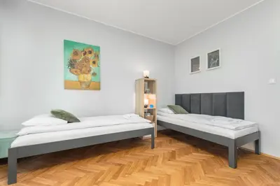 Łóżko lub łóżka w pokoju w obiekcie Apartament Inflancka by Your Freedom