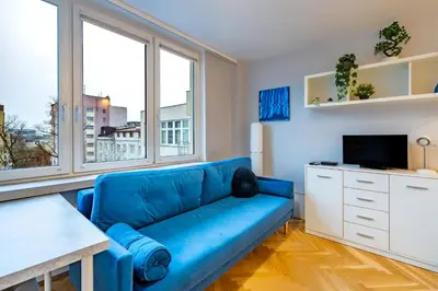 Telewizja i/lub zestaw kina domowego w obiekcie Blue Haven Apartment City Center