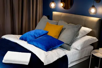 Łóżko lub łóżka w pokoju w obiekcie P&O Apartments Zachodni III
