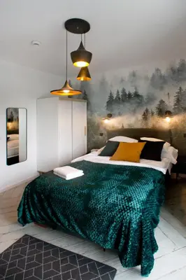 Łóżko lub łóżka w pokoju w obiekcie P&O Apartment Zachodni IV