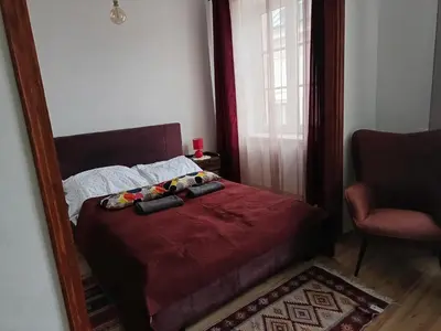 Łóżko lub łóżka w pokoju w obiekcie Studio Miodowa