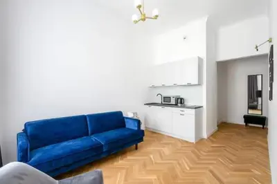 Kuchnia lub aneks kuchenny w obiekcie Apartament na Koszykowej w perełce architektonicznej