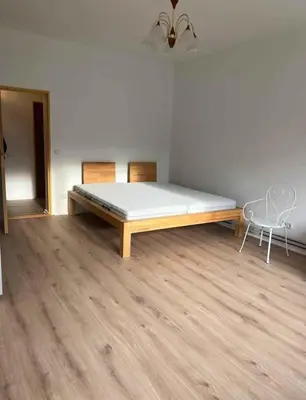 Łóżko lub łóżka w pokoju w obiekcie Apartament Warszawiak