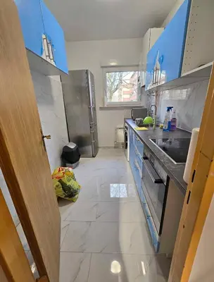 Kuchnia lub aneks kuchenny w obiekcie Apartament Warszawiak