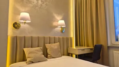 Łóżko lub łóżka w pokoju w obiekcie Apt Ligocka Premium - Apartamenty Wypoczynkowe